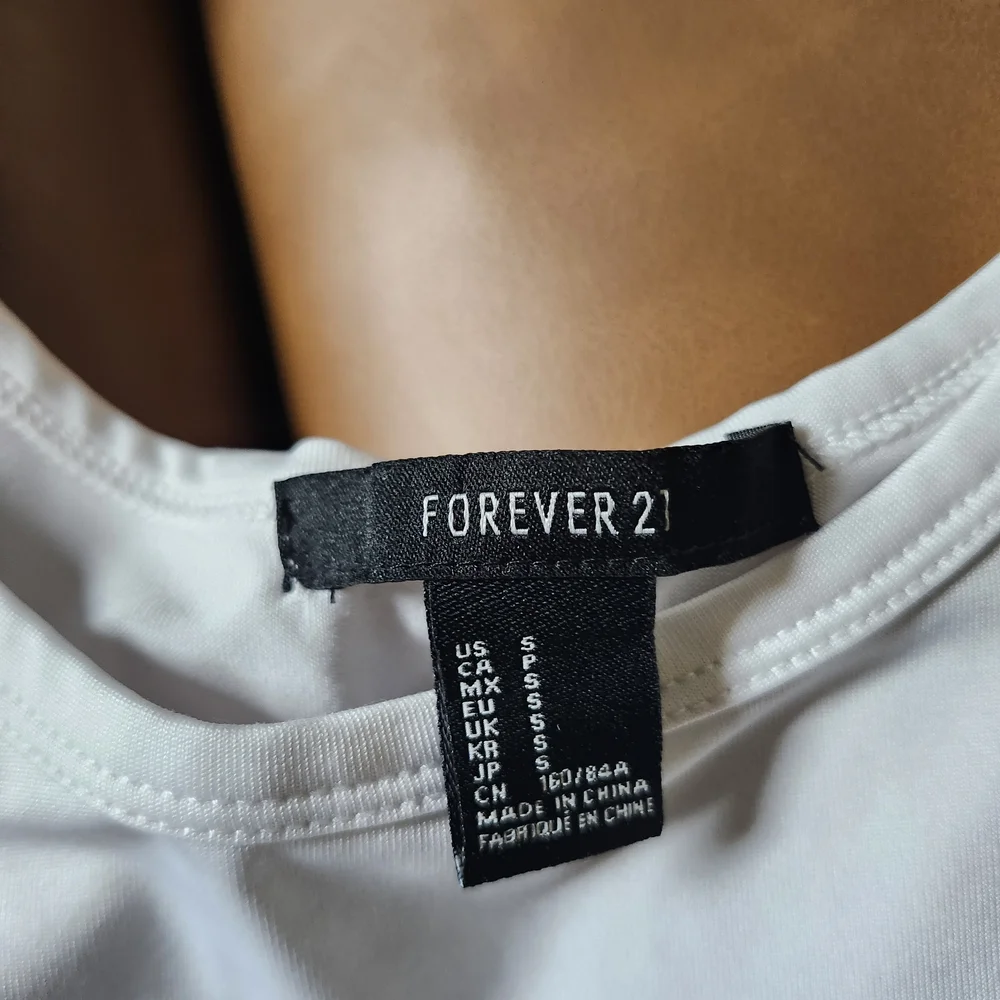 Forever 21 White Cat Face Tank Bodysuit with Blue Eyes